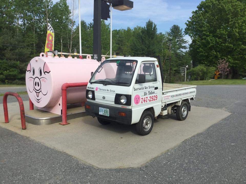 Pig gas pump with Swiftwater delivery truck